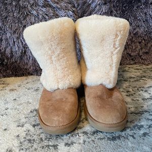 Ugg folded over fur boots.